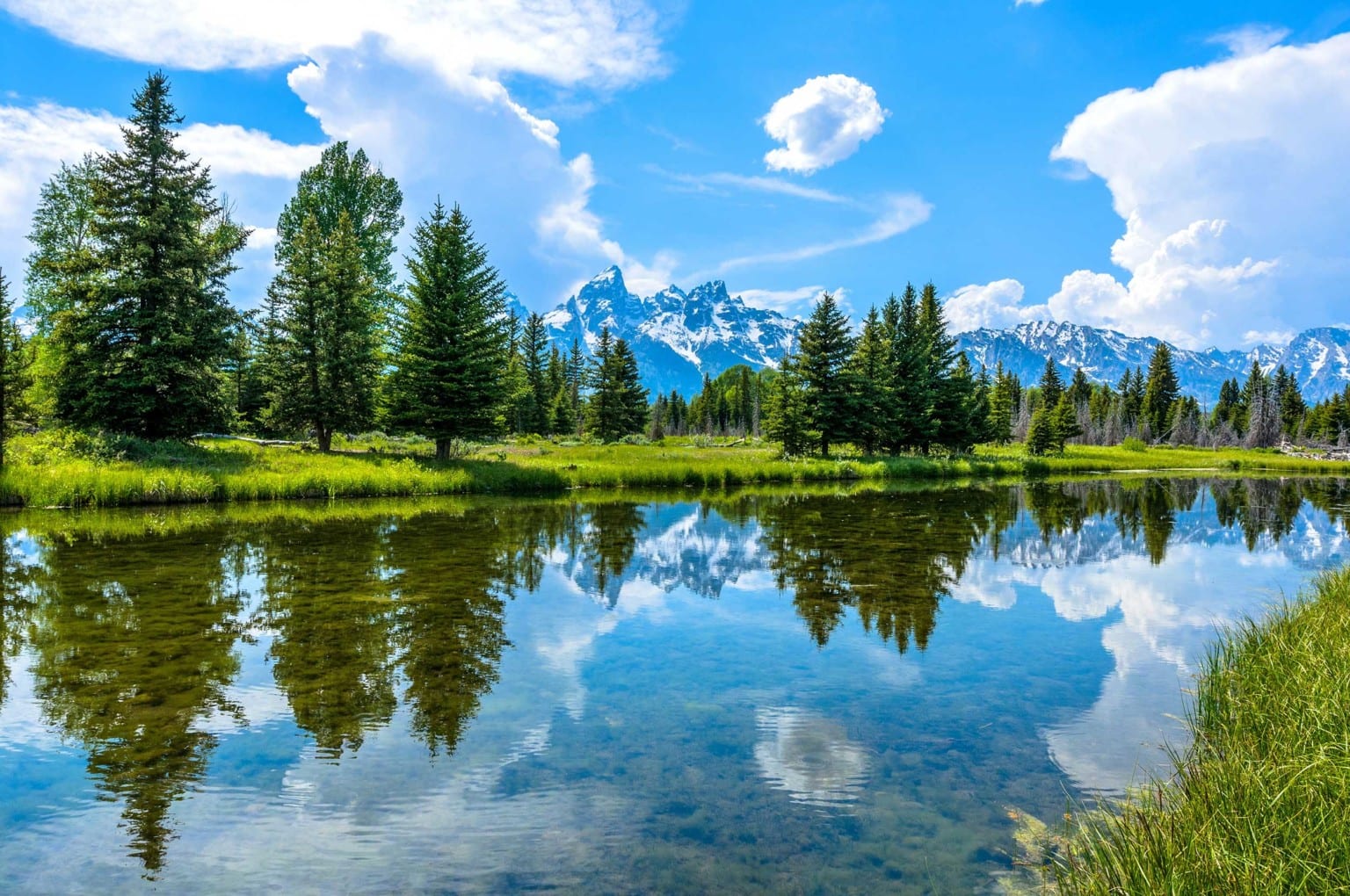 Your Summer Sojourn Awaits Grand Teton + Yellowstone National Park