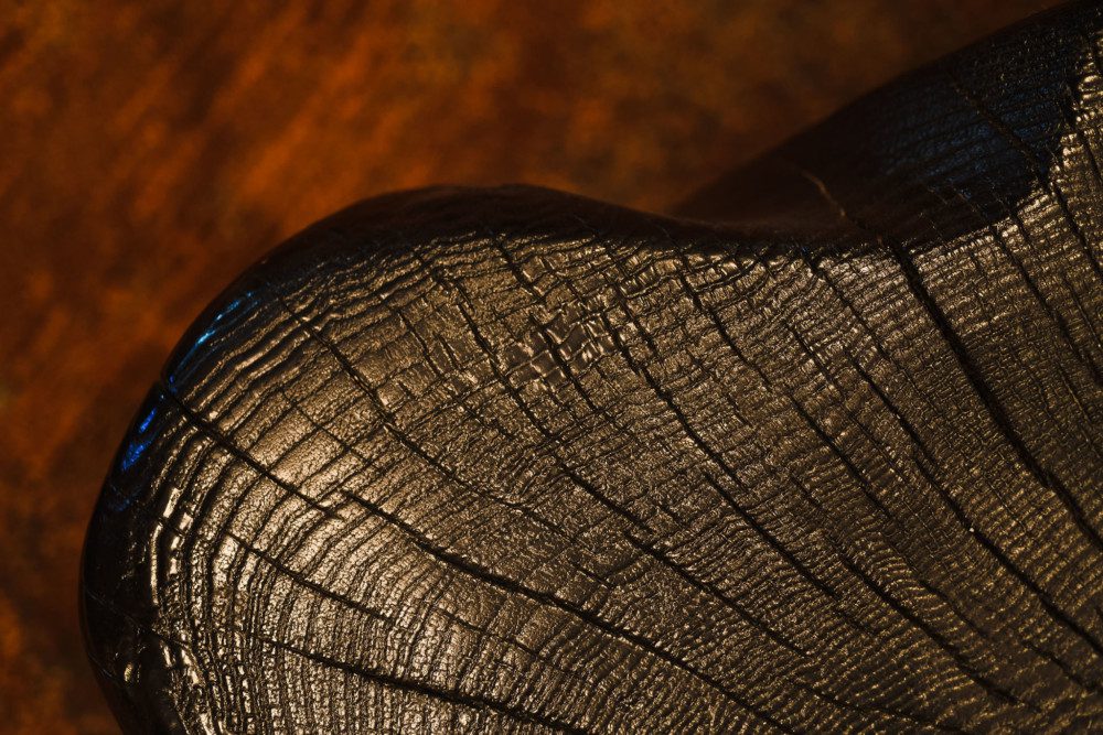 Feature Charred Log Stump coffee tables.