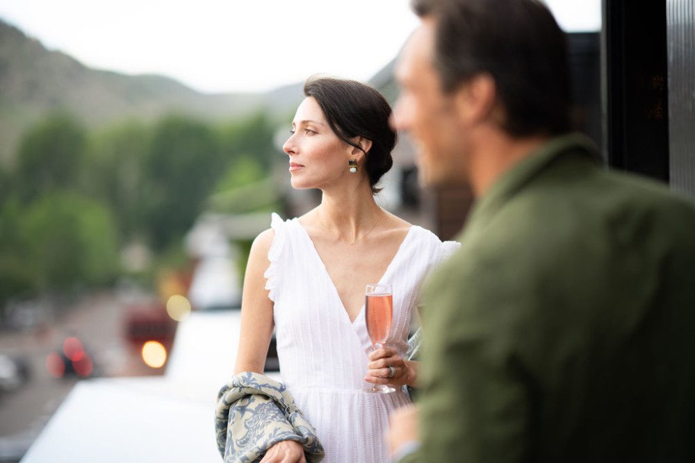A couple taking in the views from rooftop of Cloudveil.