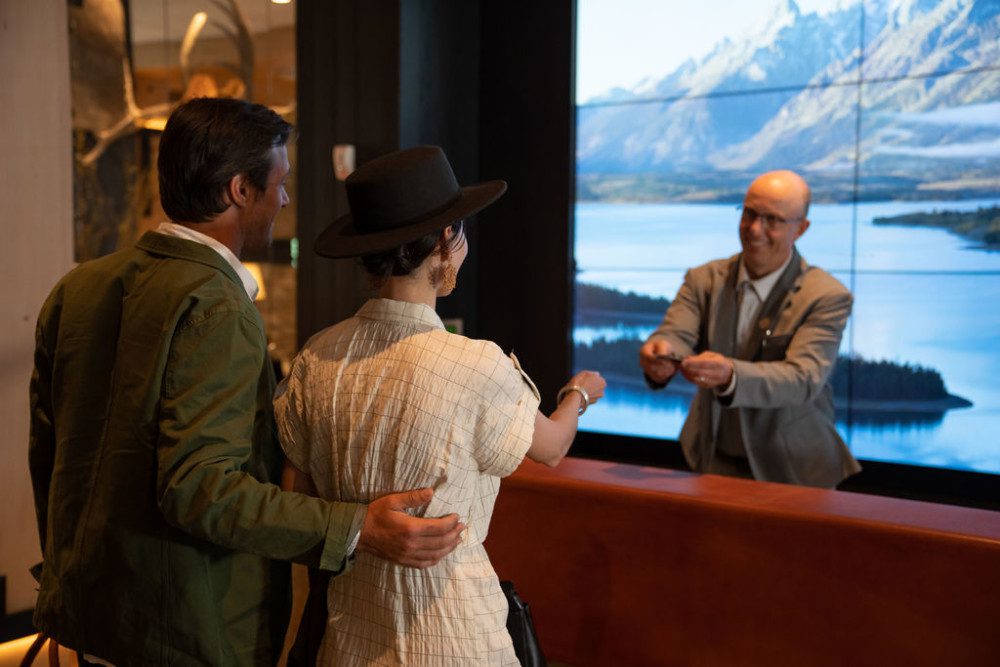 Guests checking in at hotel.