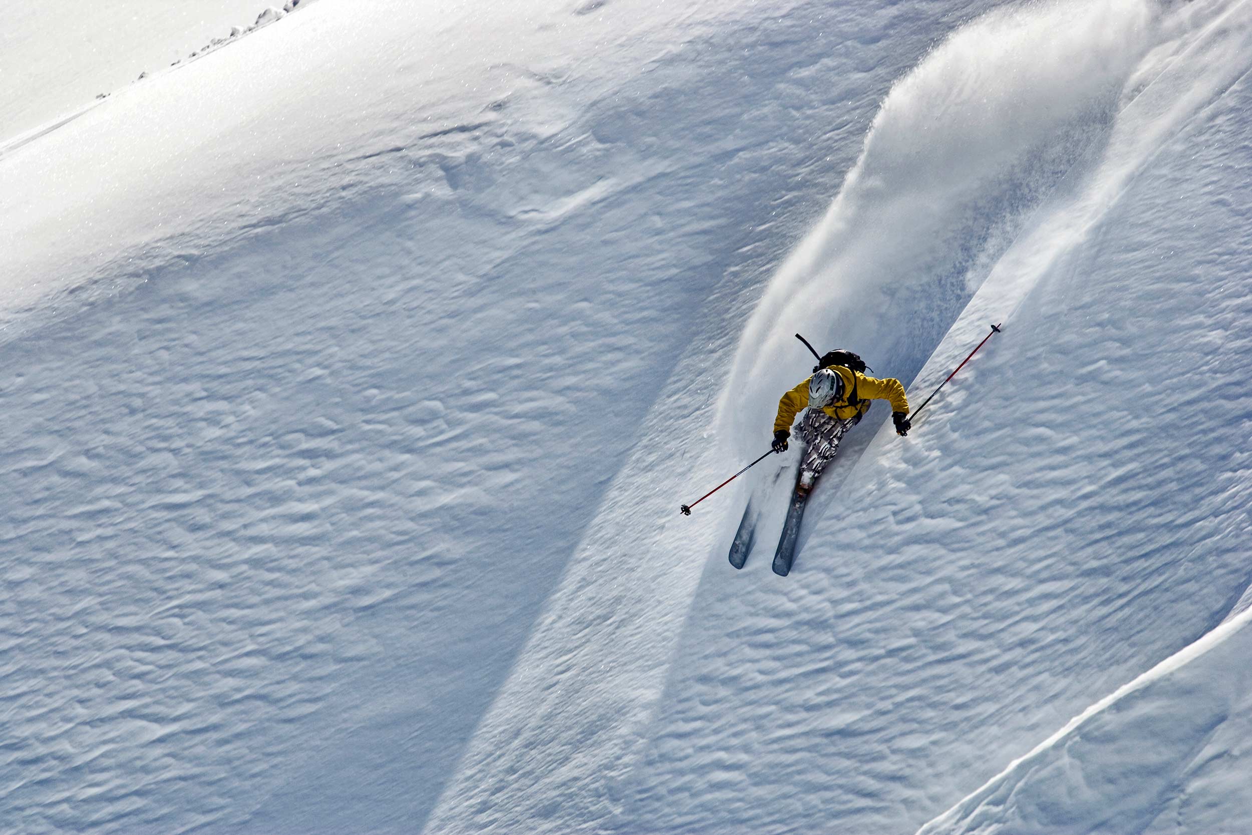 Free Ride Skier Turning In Powder Snow