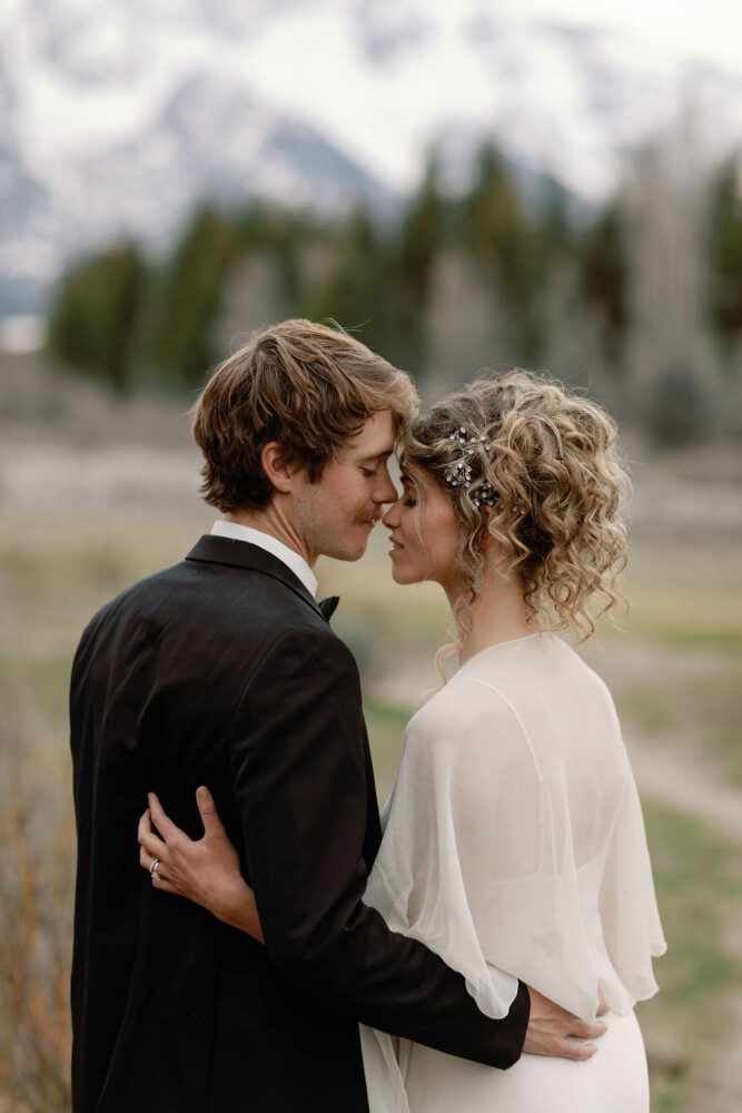 Happy couple taking wedding photos.