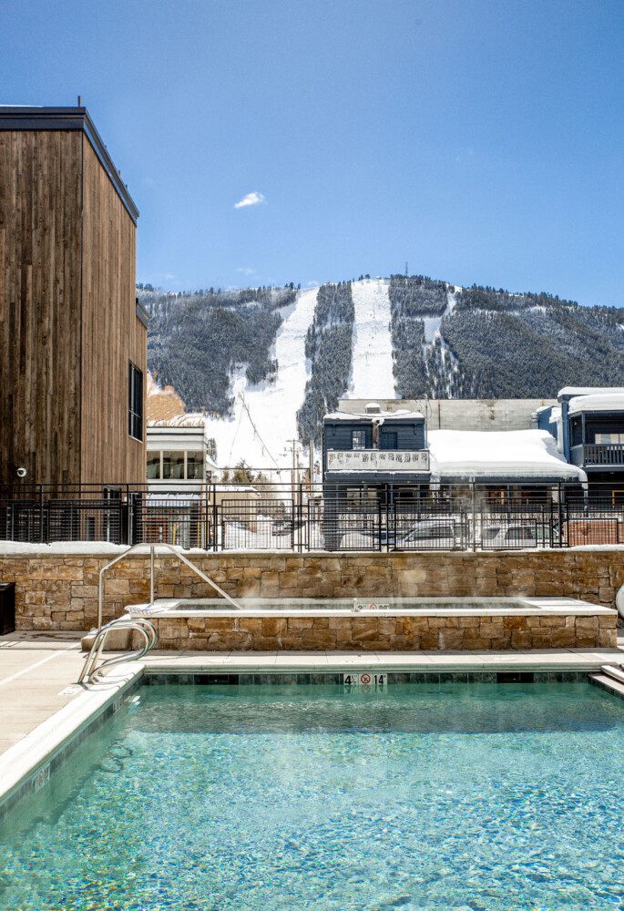 Spacious heated pool and hot tub.